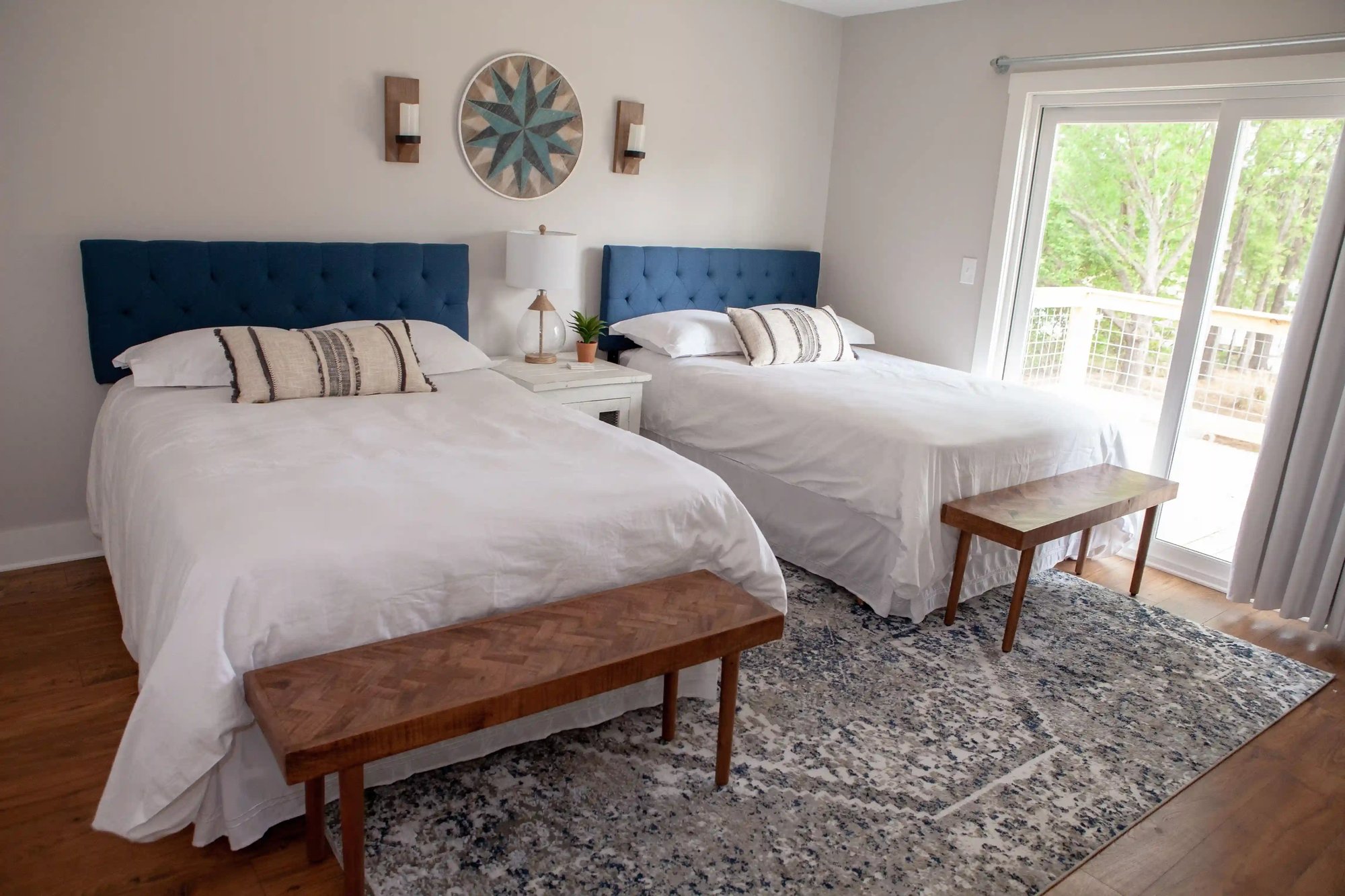 Guest Bedroom with Full Beds in Lakefront Home Remodel _ PAXISgroup Custom Home Builders in GA_11zon